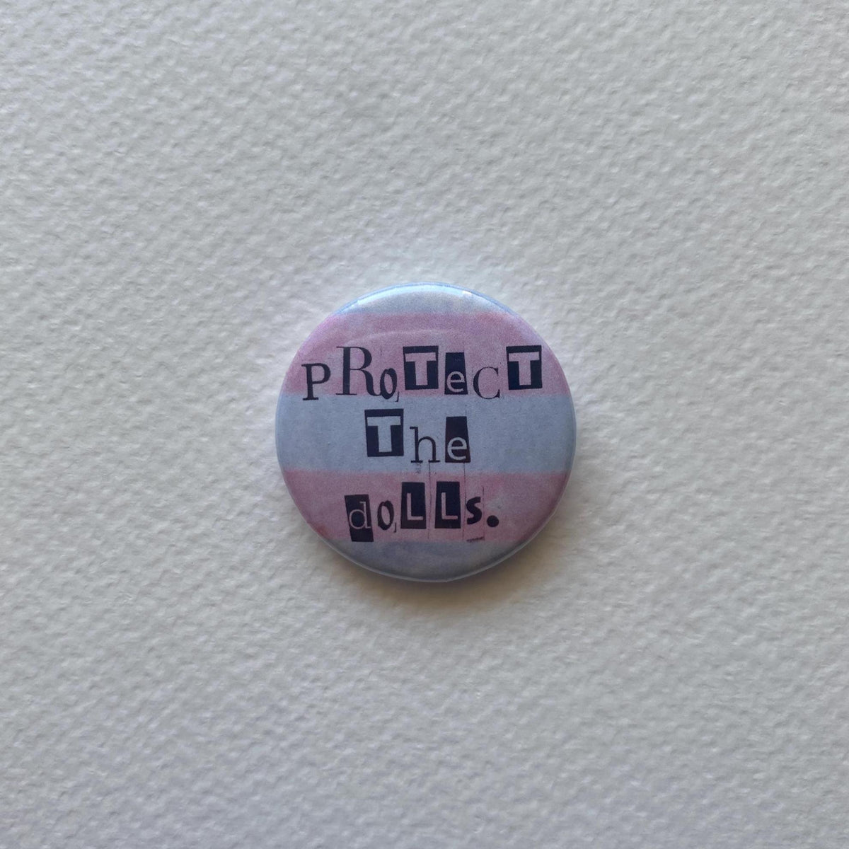 protect the dolls button